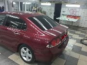Хонда Цивик - тонирование стекол 1/2 автомобиля поенкой Llumar 05.